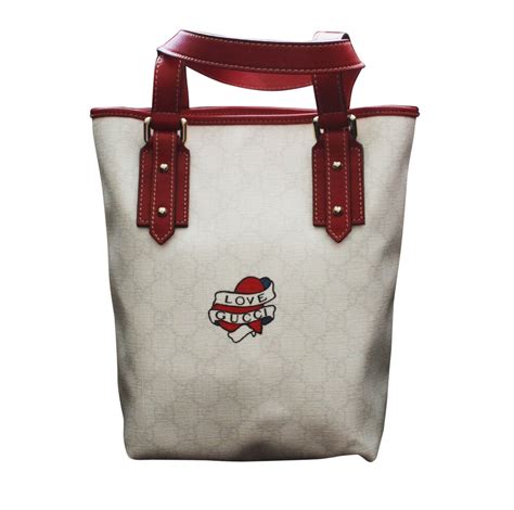 gucci tattoo bag|gucci tote bag.